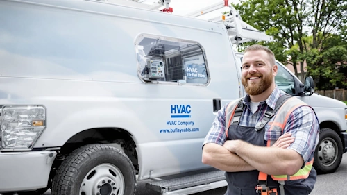 HVAC technician and service truck